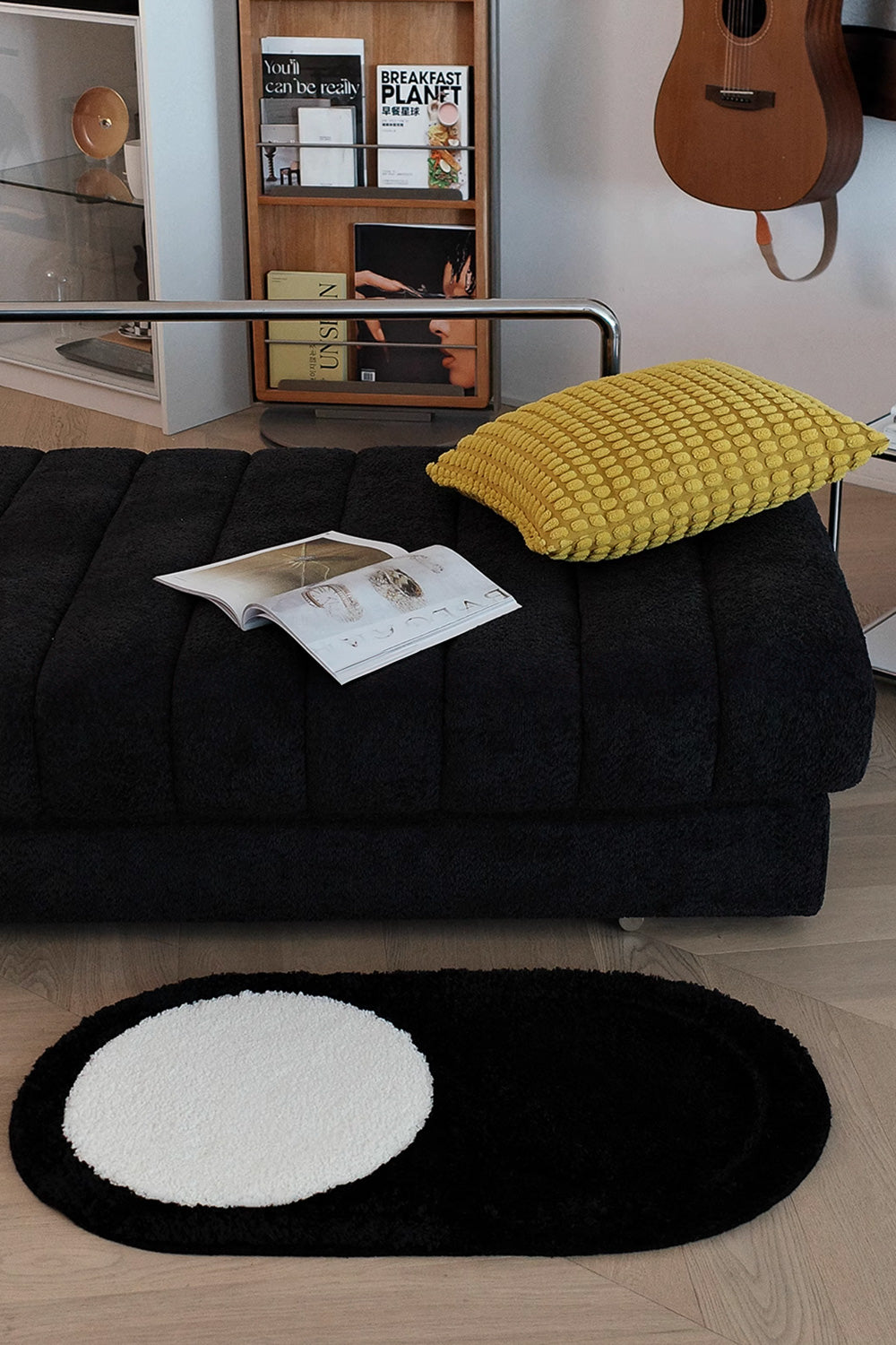 White Circle on Black Oval Mat